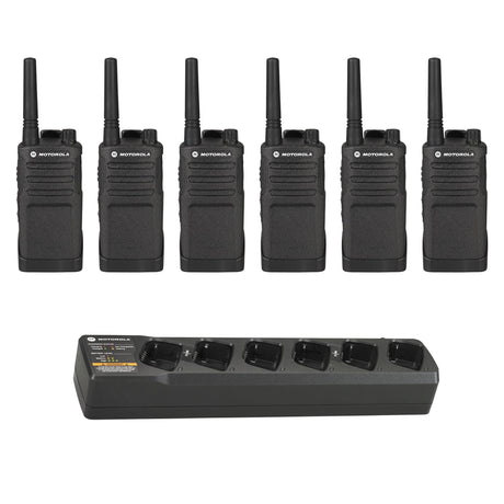 Six Motorola RMU2040 two-way radios with a multi-unit charger