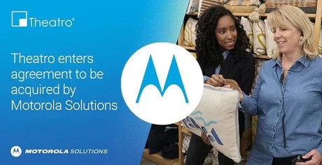 Two retail employees collaborating in a store with a banner announcing Theatro’s agreement to be acquired by Motorola Solutions, highlighting advancements in AI and voice-powered technology for frontline workers.
