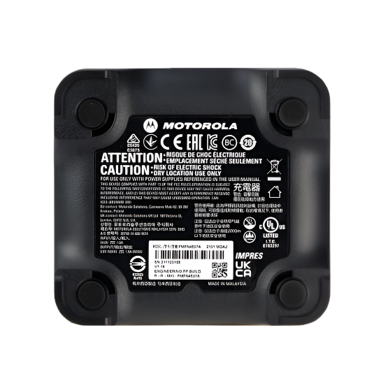 Bottom view of Motorola PMPN4576 IMPRES 2 single‑unit desktop charger with product label and ventilation details.
