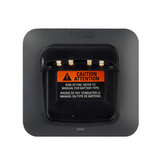 Top-down view of Motorola PMPN4576 IMPRES 2 single‑unit desktop charger showing charging bay and status indicator.