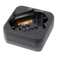 Motorola PMPN4469 single unit desktop charger for DTR600 and DTR700 digital radios with caution label and contact pins.